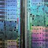 Abstract microscopic photography of a Graphics Processing Unit resembling a satellite image of a big city